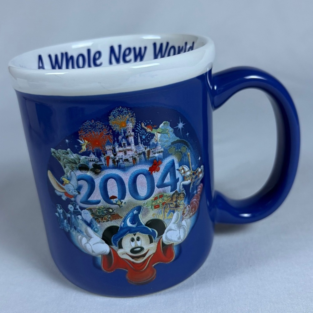 Disney Disneyland Resort 2004 A Whole New World Sorcerer Mickey Blue Coffee Mug